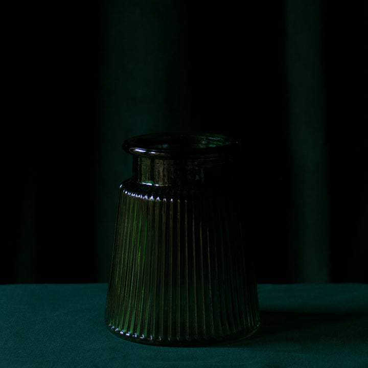 Small ribbed glass vase